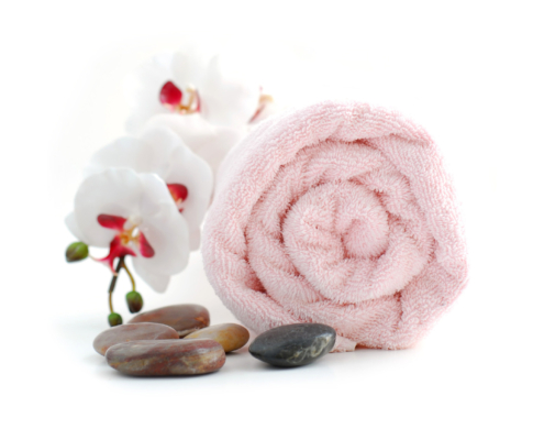 Rose rolled up spa towels